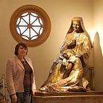 Olga Nielsen with her statue of St. Aviat